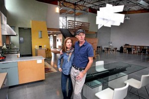 Diana Holm and Sanford Bingham, owners of document security company FileOpen, are moving into a large, live/work space in the newly opened Delaware Addition, bringing part of their business with them. (Photo credit: Dan Coyro)