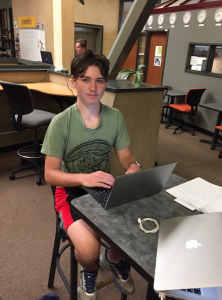 Ethan Elshyeb, age 14, taught himself to program at age 11 and is working as a programmer at passQi this summer. (Contributed)