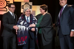 From left to right: Dr. Allyn Kaufmann a scientist at Proctor & Gamble, Inc., Secretary of Energy Ernest Moniz, Dr. Ahna Skop, associate professor at University of Wisconsin Madison, and Austin Shelton, doctoral candidate at University of Hawaii. SACNAS Board members present Dr. Ernest Moniz, U.S. Secretary of Energy with a Pendleton blanket during a traditional Native American honor ceremony. Secretary Moniz presented a keynote address to the SACNAS audience. Contributed.