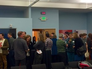 Attendees and panelists schmooze before the event. (Credit: Hilary Bryant)