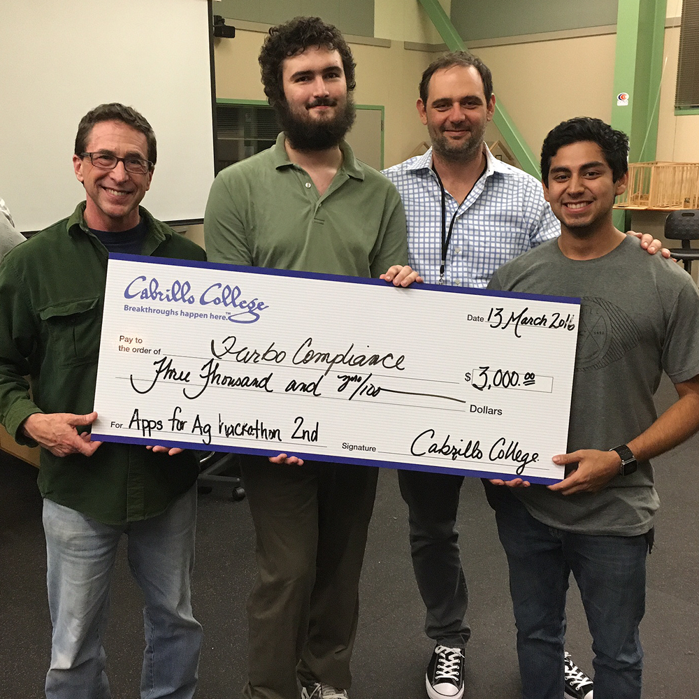 Second Place Winners: Cabrillo College team Jim Turner, art major; William Ritson, computer science major; (need name) CIS instructor; Angel Martinez, computer engineering major, combined their talents to build a website to help growers document required compliance metrics. (Contributed/Cabrillo)