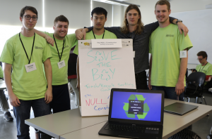 NULL Constructor team members Daniel Crews, Jason Kirn, Phuc Pham, Nigel Hardy and Tyler Chargin, ready to demonstrate their game to build environmental sustainability. (Credits: Jan Janes Media)