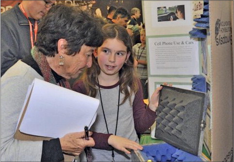 Students don science hats for Science & Engineering Fair