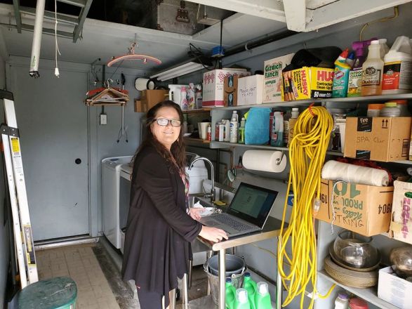Maren Elwood, a local marketing consultant and anthropologist, has turned her small BMW coup into a curbside electronics repair service. (Courtesy photo)