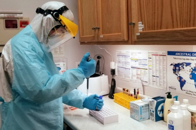 A lab technician at ARCpoint Labs in Monterey tests for the presence of antibodies specific to the coronavirus that causes COVID-19. (Courtesy of ARCpoint Labs.)