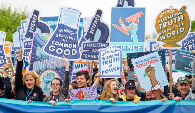 Students protest with signs