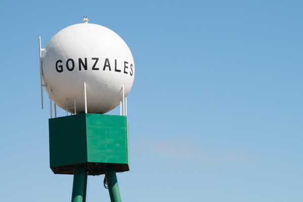 Photo of water tower in Gonzales with the word Gonzales written on it