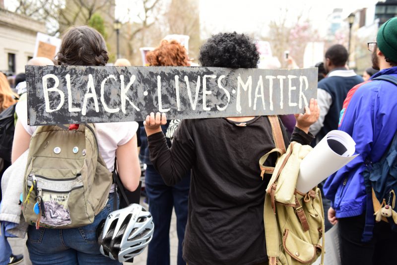 protest with Black Lives Matter sign